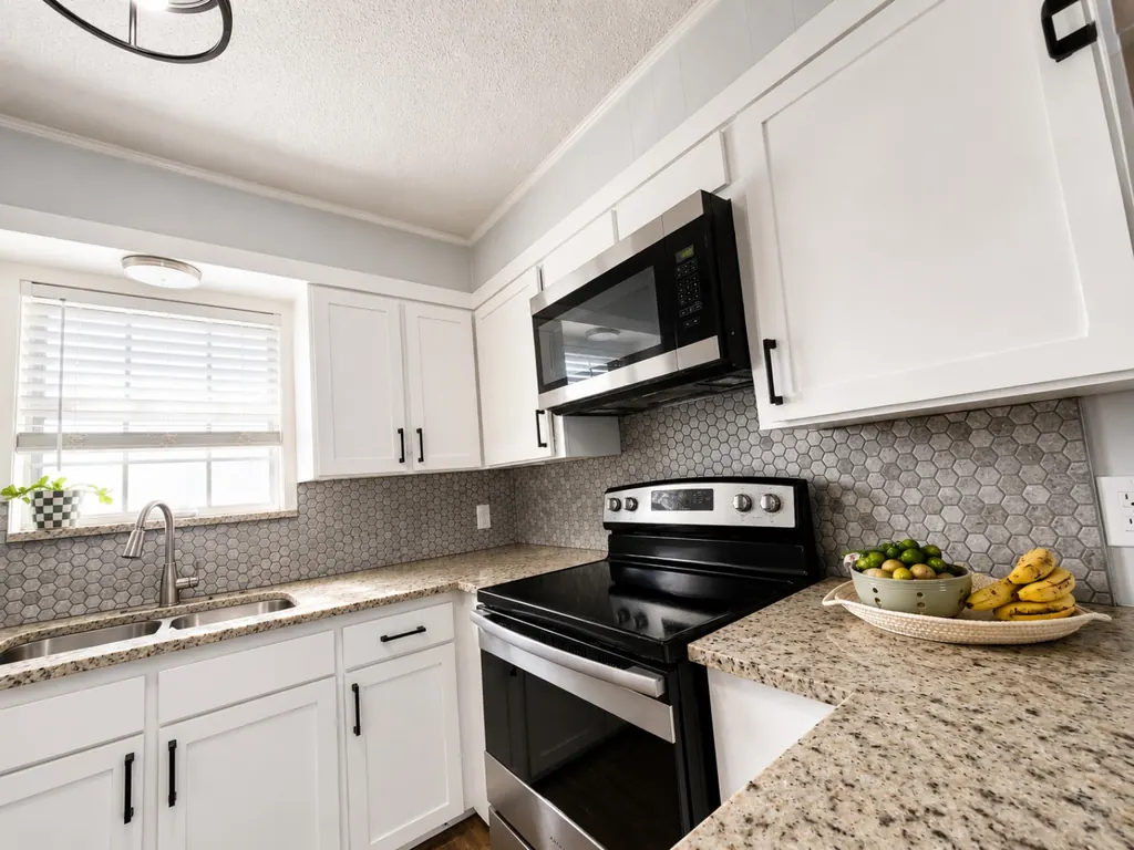 Close view of white Shaker cabinet doors